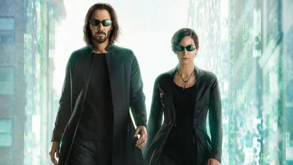 Keanu Reeves e Carrie-Anne Moss protagonisti di Matrix Resurrections, prima visione di Italia1